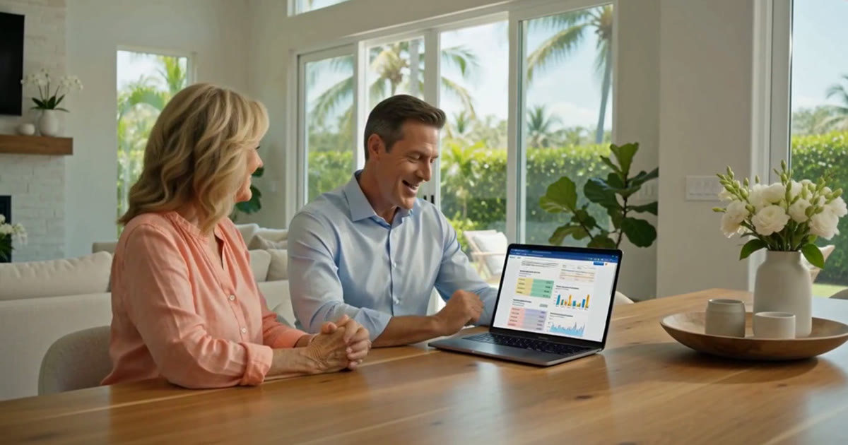 Licensed Florida insurance agent reviewing ACA marketplace plan options with a Naples client at a desk